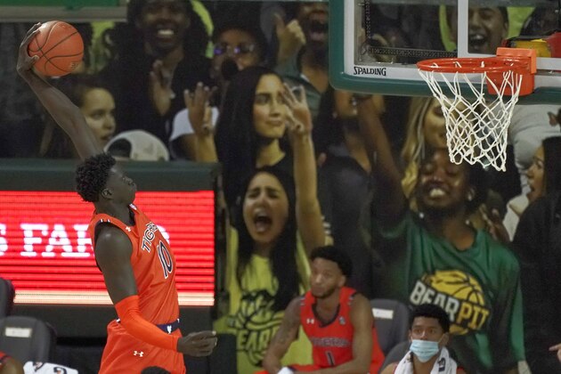 Auburn's JT Thor (10) goes up to dunk against Baylor during the second half of an NCAA college basketball game in Waco, Texas, Saturday, Jan. 30, 2021. (AP Photo/Chuck Burton)