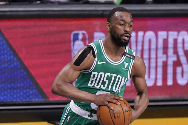 Boston Celtics guard Kemba Walker (8) looks to pass during the first quarter of Game 2 of an NBA basketball first-round playoff series against the Brooklyn Nets, Tuesday, May 25, 2021, in New York. (AP Photo/Kathy Willens)