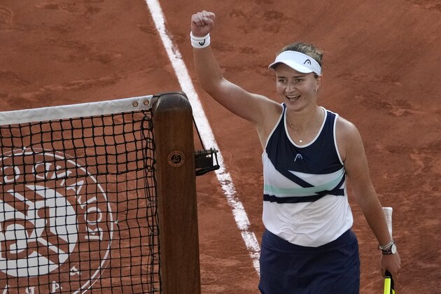 Czech Republic's Barbora Krejcikova celebrates after defeating Maria Sakkari of Greece in their semifinal match of the French Open tennis tournament at the Roland Garros stadium Thursday, June 10, 2021 in Paris. (AP Photo/Christophe Ena)