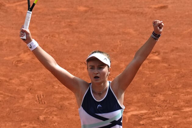 Czech Republic's Barbora Krejcikova celebrates as she defeats Russia's Anastasia Pavlyuchenkova during their final match of the French Open tennis tournament at the Roland Garros stadium Saturday, June 12, 2021 in Paris. The unseeded Czech player defeated Anastasia Pavlyuchenkova 6-1, 2-6, 6-4 in the final. (AP Photo/Christophe Ena)