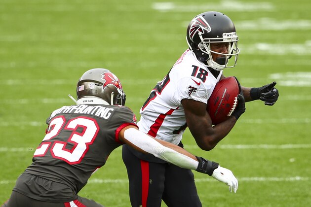 Atlanta Falcons wide receiver Calvin Ridley (18) carries the ball as Tampa Bay Buccaneers cornerback Sean Murphy-Bunting (23) pursues during the first half of an NFL football game, Sunday, Jan. 3, 2021, in Tampa, Fla. (AP Photo/Kevin Sabitus)