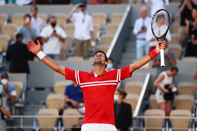 PARIS, FRANCE - JUNE 13: Novak Djokovic of Serbia celebrates victory after winning his Men's Singles Final match against Stefanos Tsitsipas of Greece during Day Fifteen of the 2021 French Open at Roland Garros on June 13, 2021 in Paris, France. (Photo by Julian Finney/Getty Images)