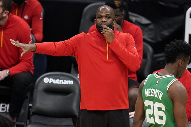 Atlanta Hawks associate head coach Nate McMillan calls to his players during the second half of an NBA basketball game against the Boston Celtics, Wednesday, Feb. 17, 2021, in Boston. (AP Photo/Charles Krupa)