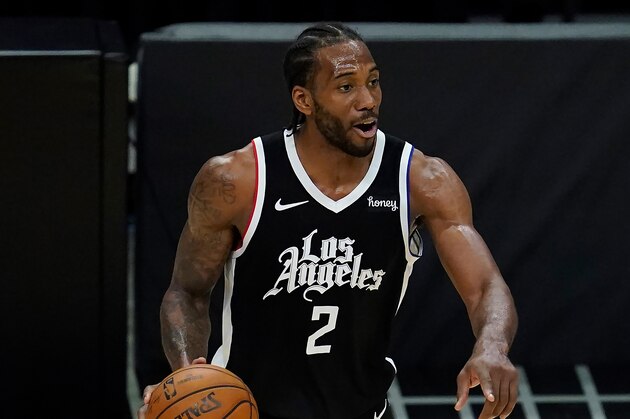 Los Angeles Clippers forward Kawhi Leonard (2) controls the ball during Game 7 of an NBA basketball first-round playoff series against the Dallas Mavericks Sunday, June 6, 2021, in Los Angeles, Calif. (AP Photo/Ashley Landis)