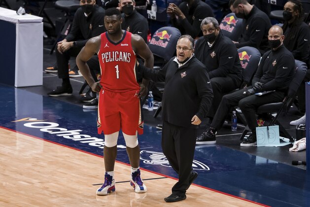 New Orleans Pelicans forward Zion Williamson (1) and head coach Stan Van Gundy talk during a time out in the third quarter of an NBA basketball game against the Dallas Mavericks in New Orleans, Saturday, March 27, 2021. (AP Photo/Derick Hingle)
