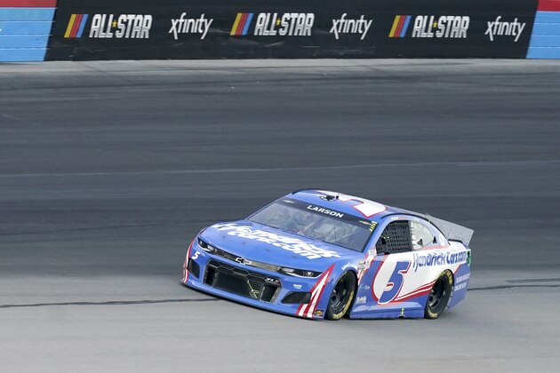 Kyle Larson drivers out of Turn 4 during the NASCAR Cup Series All-Star auto race at Texas Motor Speedway in Fort Worth, Texas, Sunday, June 13, 2021. (AP Photo/Tony Gutierrez)