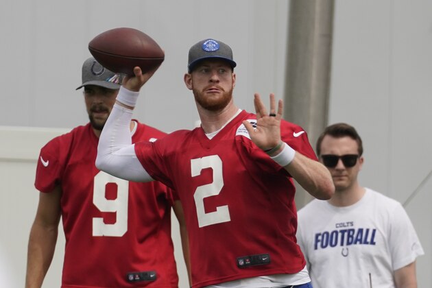 Indianapolis Colts quarterback Carson Wentz (2 ) throws as the team practiced at the NFL football team's facility, Thursday, May 27, 2021, in Indianapolis. (AP Photo/Darron Cummings)