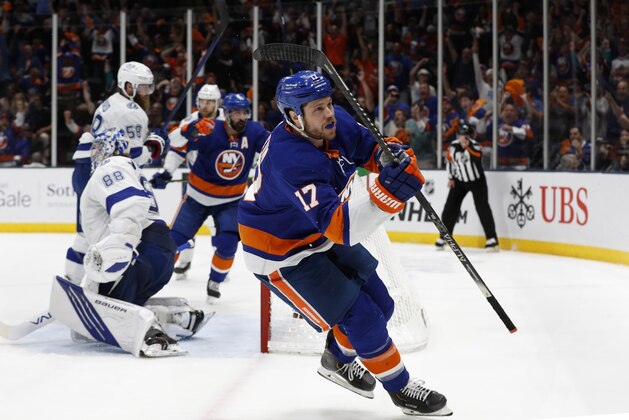 New York Islanders left wing Matt Martin (17) celebrates after scoring a goal against Tampa Bay Lightning goaltender Andrei Vasilevskiy (88) during the second period of Game 4 of an NHL hockey Stanley Cup semifinal, Saturday, June 19, 2021, in Uniondale, N.Y. (AP Photo/Jim McIsaac)