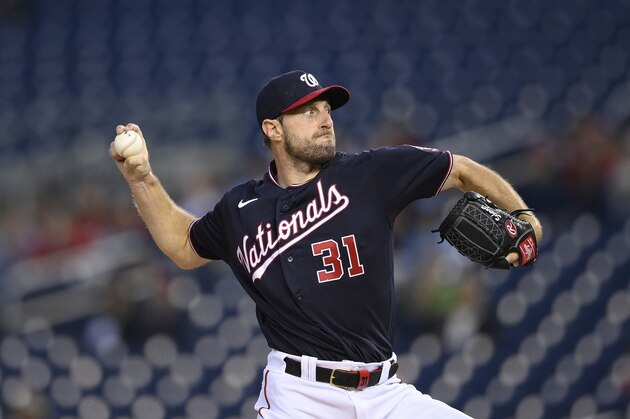 Washington Nationals starting pitcher Max Scherzer delivers a pitch during the first inning of a baseball game against the San Francisco Giants, Friday, June 11, 2021, in Washington. (AP Photo/Nick Wass)