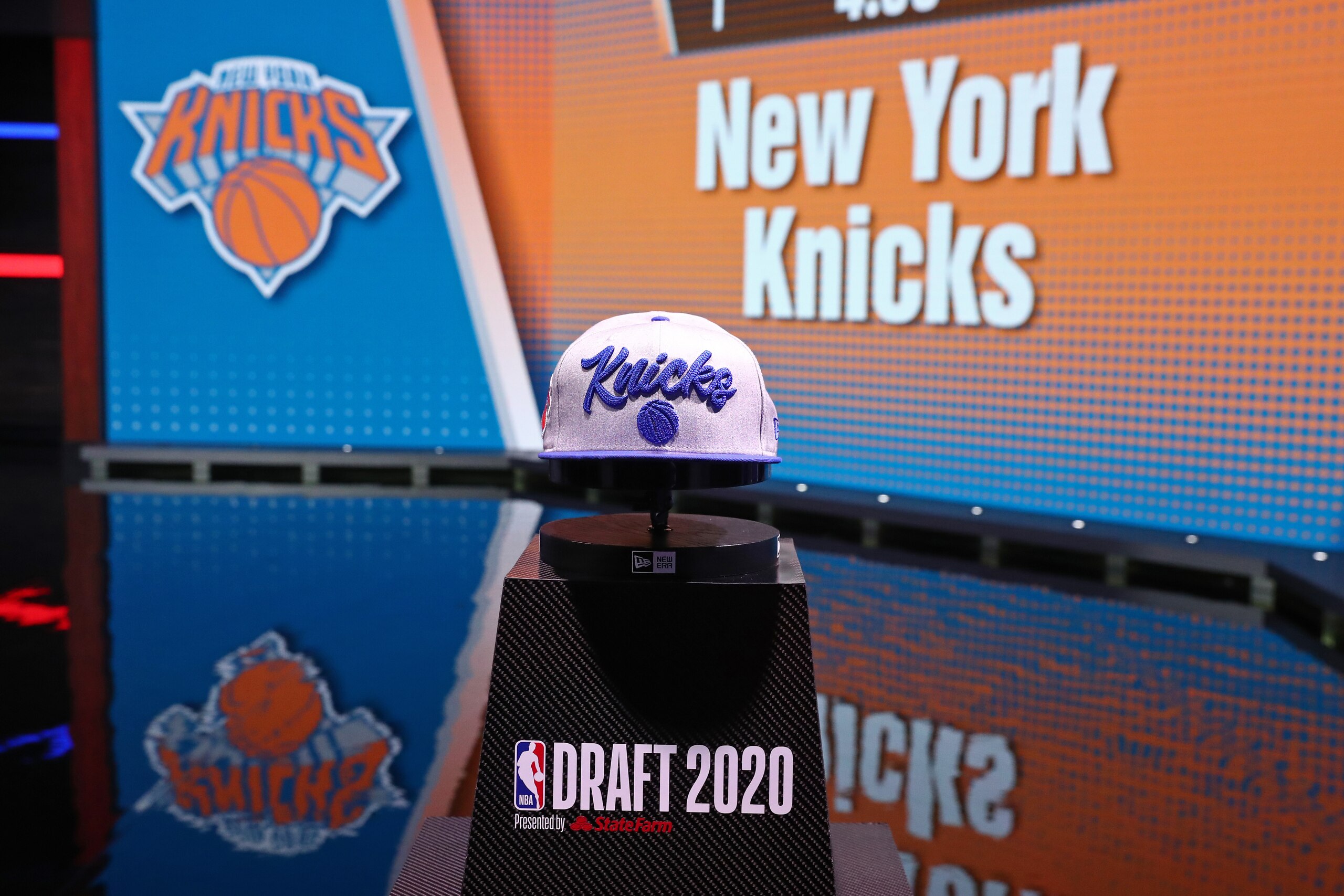 BRISTOL, CT - NOVEMBER 18: A wide angle view of the draft stage with the New York Knicks hat during the 2020 NBA Draft on November 18, 2020 in Bristol, Connecticut at ESPN Headquarters. NOTE TO USER: User expressly acknowledges and agrees that, by downloading and/or using this photograph, user is consenting to the terms and conditions of the Getty Images License Agreement. Mandatory Copyright Notice: Copyright 2020 NBAE (Photo by Nathaniel S. Butler/NBAE via Getty Images)