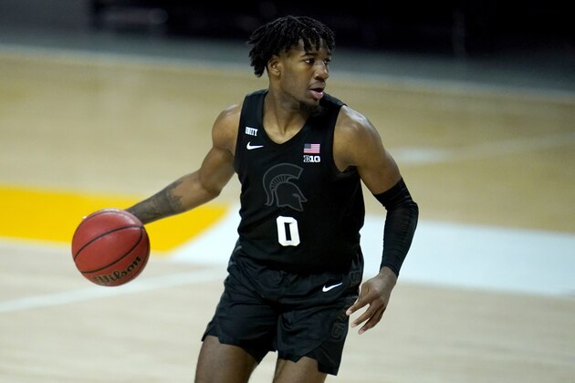 Michigan State forward Aaron Henry works the floor against Maryland during the first half of an NCAA college basketball game, Sunday, Feb. 28, 2021, in College Park, Md. (AP Photo/Julio Cortez)