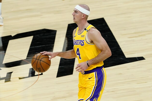 Los Angeles Lakers guard Alex Caruso (4) against the Phoenix Suns during the first half of Game 5 of an NBA basketball first-round playoff series against the Phoenix Suns, Tuesday, June 1, 2021, in Phoenix. (AP Photo/Matt York)