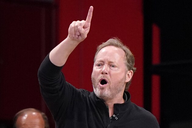 Milwaukee Bucks head coach Mike Budenholzer gestures toward his players during the first half of Game 2 of an NBA basketball second-round playoff series against the Brooklyn Nets, Monday, June 7, 2021, in New York. (AP Photo/Kathy Willens)