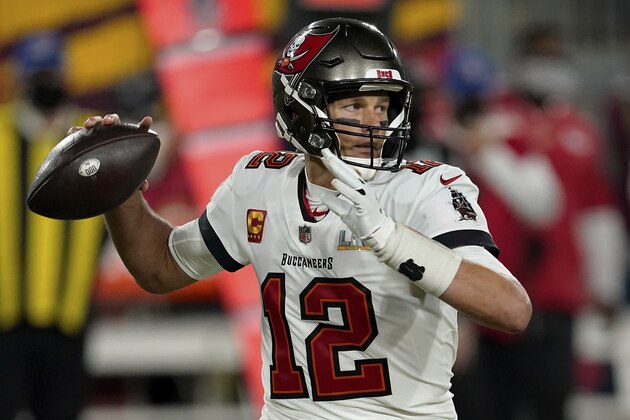 Tampa Bay Buccaneers quarterback Tom Brady (12) attempts to make a pass during the first half of the NFL Super Bowl 55 football game against the Kansas City Chiefs, Sunday, Feb. 7, 2021, in Tampa, Fla. The Tampa Bay Buccaneers defeated the Kansas City Chiefs 31-9. (AP Photo/Steve Luciano)
