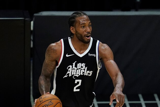 Los Angeles Clippers forward Kawhi Leonard (2) controls the ball during Game 7 of an NBA basketball first-round playoff series against the Dallas Mavericks Sunday, June 6, 2021, in Los Angeles, Calif. (AP Photo/Ashley Landis)