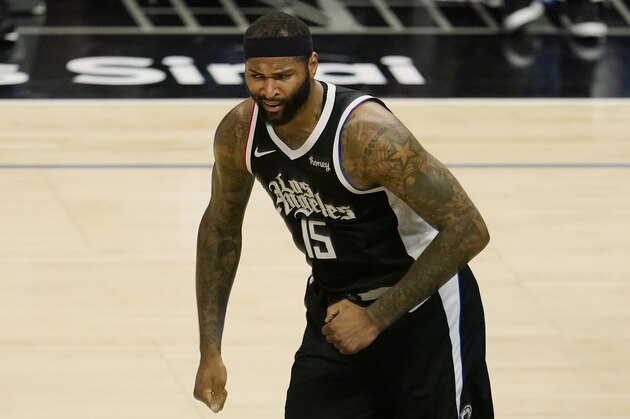 Los Angeles Clippers center DeMarcus Cousins reacts after scoring during an NBA basketball game Sunday, May 9, 2021, in Los Angeles. (AP Photo/Marcio Jose Sanchez)