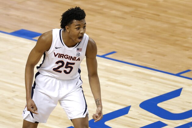 GREENSBORO, NORTH CAROLINA - MARCH 11: Trey Murphy III #25 of the Virginia Cavaliers reacts following a three point basket during the second half of their quarterfinals game against the Syracuse Orange in the ACC Men's Basketball Tournament at Greensboro Coliseum on March 11, 2021 in Greensboro, North Carolina. (Photo by Jared C. Tilton/Getty Images)