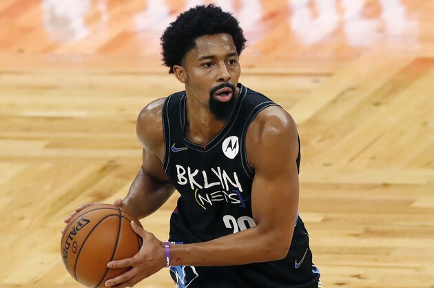 Brooklyn Nets' Spencer Dinwiddie plays against the Boston Celtics during the first half of an NBA basketball game, Friday, Dec. 25, 2020, in Boston. (AP Photo/Michael Dwyer)