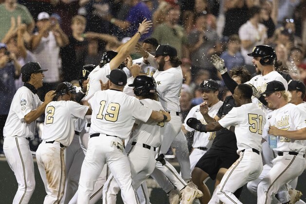 Vanderbilt players celebrate their 6-5 win against Stanford during a baseball game in the College World Series Wednesday, June 23, 2021, at TD Ameritrade Park in Omaha, Neb. (AP Photo/Rebecca S. Gratz)