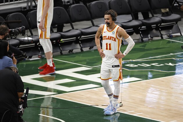 MILWAUKEE, WI - JUNE 23: Trae Young #11 of the Atlanta Hawks is interviewed after the game against the Milwaukee Bucks during Game 1 of the Eastern Conference Finals of the 2021 NBA Playoffs on June 23, 2021 at the Fiserv Forum Center in Milwaukee, Wisconsin. NOTE TO USER: User expressly acknowledges and agrees that, by downloading and or using this Photograph, user is consenting to the terms and conditions of the Getty Images License Agreement. Mandatory Copyright Notice: Copyright 2021 NBAE (Photo by Kamil Krzaczynski/NBAE via Getty Images).