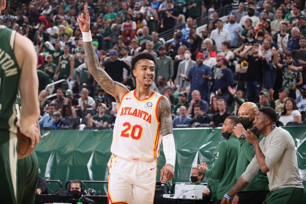 MILWAUKEE, WI - JUNE 23: John Collins #20 of the Atlanta Hawks celebrates during Game 1 of the Eastern Conference Finals of the 2021 NBA Playoffs on June 23, 2021 at the Fiserv Forum Center in Milwaukee, Wisconsin. NOTE TO USER: User expressly acknowledges and agrees that, by downloading and or using this Photograph, user is consenting to the terms and conditions of the Getty Images License Agreement. Mandatory Copyright Notice: Copyright 2021 NBAE (Photo by Nathaniel S. Butler/NBAE via Getty Images).
