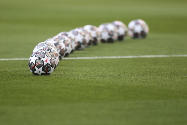 Balls are displayed on the pitch prior to the start of the Champions League final soccer match between Manchester City and Chelsea at the Dragao Stadium in Porto, Portugal, Saturday, May 29, 2021. (Carl Recine/Pool via AP)