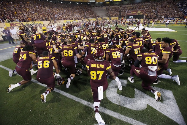 Arizona State football team gather together prior to an NCAA college football game against Southern California Saturday, Sept. 26, 2015, in Tempe, Ariz. (AP Photo/Ross D. Franklin)