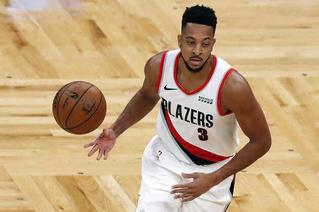Portland Trail Blazers' CJ McCollum plays against the Boston Celtics during the first half of an NBA basketball game, Sunday, May 2, 2021, in Boston. (AP Photo/Michael Dwyer)