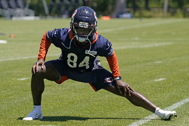Chicago Bears wide receiver Marquise Goodwin stretches during NFL football practice in Lake Forest, Ill., Wednesday, June 16, 2021. (AP Photo/Nam Y. Huh)