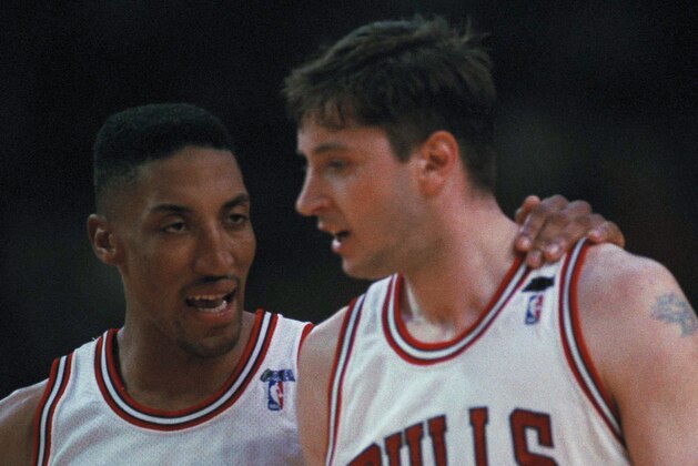 Scottie Pippen and Toni Kukoc of the Chicago Bulls walk down court after the Bulls scored during the fourth quarter against the New York Knicks in Chicago, Sunday, May 15, 1994. The Bulls beat the Knicks 95-83 to tie the series 2-2 in the Eastern Conference semifinals. (AP Photo/John Swart)