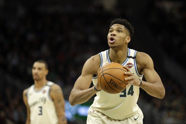Milwaukee Bucks' Giannis Antetokounmpo shoots a free throw during the second half of an NBA basketball game against the Chicago Bulls Monday, Jan. 20, 2020, in Milwaukee. (AP Photo/Aaron Gash)