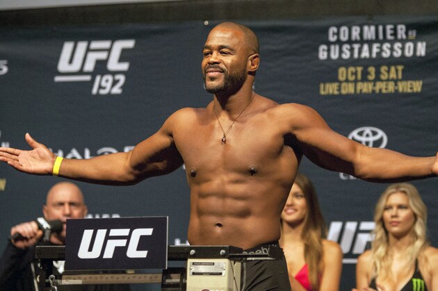 UFC fighter Rashad Evans extends his arms during the weigh in for UFC 192, Friday, Oct. 2, 2015 in Houston. (AP Photo/Juan DeLeon)