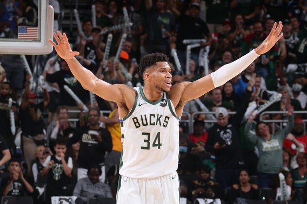 MILWAUKEE, WI - JUNE 25: Giannis Antetokounmpo #34 of the Milwaukee Bucks puts his hands up during the game against the Atlanta Hawks during Game 1 of the Eastern Conference Finals of the 2021 NBA Playoffs on June 25, 2021 at the Fiserv Forum Center in Milwaukee, Wisconsin. NOTE TO USER: User expressly acknowledges and agrees that, by downloading and or using this Photograph, user is consenting to the terms and conditions of the Getty Images License Agreement. Mandatory Copyright Notice: Copyright 2021 NBAE (Photo by Nathaniel S. Butler/NBAE via Getty Images).