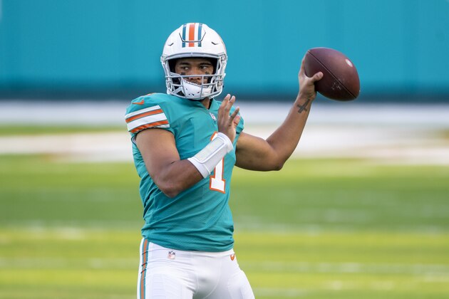Miami Dolphins quarterback Tua Tagovailoa (1) throws the ball as he warms up on the field before the Dolphins take on the Kansas City Chiefs during an NFL football game, Sunday, Dec. 13, 2020, in Miami Gardens, Fla. (AP Photo/Doug Murray)