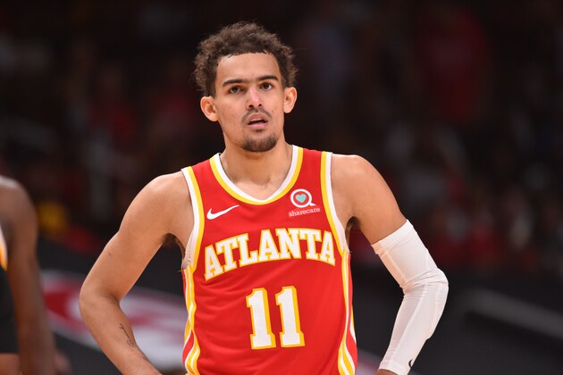 ATLANTA, GA - JUNE 27: Trae Young #11 of the Atlanta Hawks looks on during Game 3 of the Eastern Conference Finals of the 2021 NBA Playoffs on June 27, 2021 at State Farm Arena in Atlanta, Georgia. NOTE TO USER: User expressly acknowledges and agrees that, by downloading and/or using this Photograph, user is consenting to the terms and conditions of the Getty Images License Agreement. Mandatory Copyright Notice: Copyright 2021 NBAE (Photo by Jesse D. Garrabrant/NBAE via Getty Images)