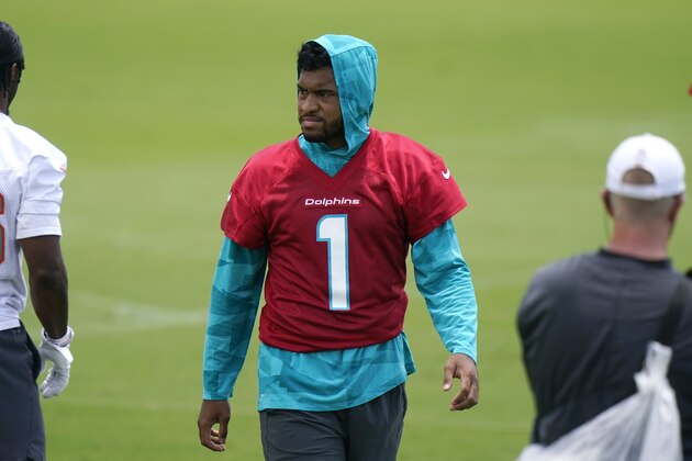Miami Dolphins quarterback Tua Tagovailoa (1) works out at the team's NFL football training facility, Wednesday, May 26, 2021, in Davie, Fla. (AP Photo/Lynne Sladky)