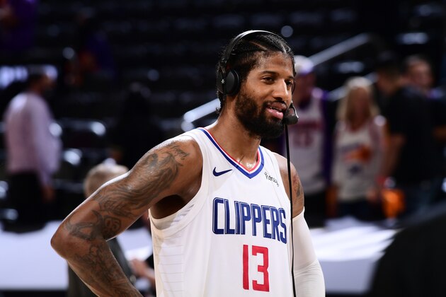 PHOENIX, AZ - JUNE 28: Paul George #13 of the LA Clippers is interviewed after the game against the Phoenix Suns during Game 5 of the Western Conference Finals of the 2021 NBA Playoffs on June 28, 2021 at Phoenix Suns Arena in Phoenix, Arizona. NOTE TO USER: User expressly acknowledges and agrees that, by downloading and or using this photograph, user is consenting to the terms and conditions of the Getty Images License Agreement. Mandatory Copyright Notice: Copyright 2021 NBAE (Photo by Michael Gonzales/NBAE via Getty Images)