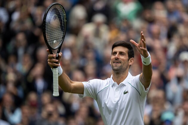 LONDON, ENGLAND - JUNE 30: Novak Djokovic of Serbia celebrates victory after winning his Men's Singles Second Round match against Kevin Anderson of South Africa during Day Three of The Championships - Wimbledon 2021 at All England Lawn Tennis and Croquet Club on June 30, 2021 in London, England. (Photo by AELTC/Ian Walton - Pool/Getty Images)