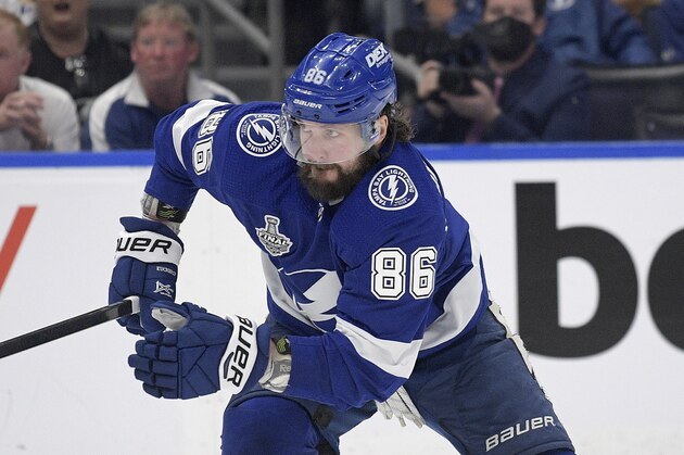 Tampa Bay Lightning right wing Nikita Kucherov (86) follows a play during the second period of Game 2 of the NHL hockey Stanley Cup finals series against the Montreal Canadiens, Wednesday, June 30, 2021, in Tampa, Fla. (AP Photo/Phelan M. Ebenhack)