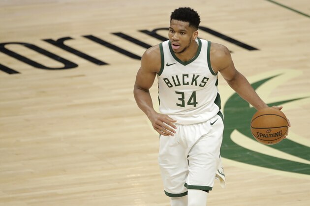 Milwaukee Bucks' Giannis Antetokounmpo dribbles during the second half of an NBA basketball game against the Washington Wizards Wednesday, May 5, 2021, in Milwaukee. (AP Photo/Aaron Gash)