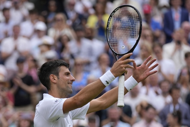 Serbia's Novak Djokovic celebrates after defeating Chile's Cristian Garin during the men's singles fourth round match on day seven of the Wimbledon Tennis Championships in London, Monday, July 5, 2021. (AP Photo/Kirsty Wigglesworth) Serbia's Novak Djokovic celebrates after defeating Chile's Cristian Garin during the men's singles fourth round match on day seven of the Wimbledon Tennis Championships in London, Monday, July 5, 2021. (AP Photo/Kirsty Wigglesworth)