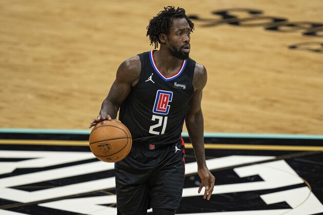 Los Angeles Clippers guard Patrick Beverley (21) brings the ball up court against the Charlotte Hornets during an NBA basketball game in Charlotte, N.C., Thursday, May 13, 2021. (AP Photo/Jacob Kupferman)