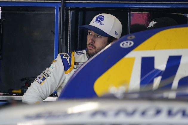 NASCAR Cup Series driver Chase Elliott looks on after ending his race during a NASCAR Cup Series at Atlanta Motor Speedway on Sunday, March 21, 2021, in Hampton, Ga. (AP Photo/Brynn Anderson)