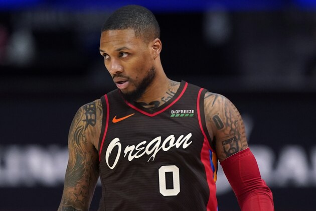 Portland Trail Blazers guard Damian Lillard plays during the first half of an NBA basketball game, Wednesday, March 31, 2021, in Detroit. (AP Photo/Carlos Osorio)