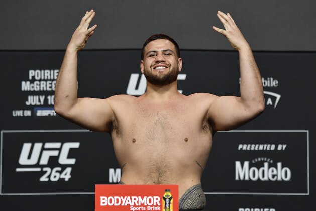 LAS VEGAS, NEVADA - JULY 09: Tai Tuivasa of Australia poses on the scale during the UFC 264 official weigh-in at UFC APEX on July 09, 2021 in Las Vegas, Nevada. (Photo by Jeff Bottari/Zuffa LLC)