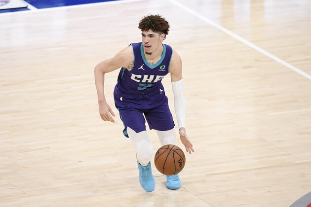 Charlotte Hornets guard LaMelo Ball (2) dribbles the ball during the second half of an NBA basketball game against the Washington Wizards, Sunday, May 16, 2021, in Washington. (AP Photo/Nick Wass)