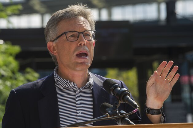 Cleveland Indians President Paul Dolan speaks at the unveiling of a statue honoring Indians Hall of Fame coach and player Lou Boudreau, before the Indians' baseball game against the New York Yankees in Cleveland, Saturday, Aug. 5, 2017. (AP Photo/Phil Long)