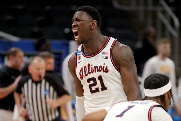 INDIANAPOLIS, INDIANA - MARCH 21: Kofi Cockburn #21 of the Illinois Fighting Illini reacts to a basket against the Loyola Chicago Ramblers during the first half in the second round game of the 2021 NCAA Men's Basketball Tournament at Bankers Life Fieldhouse on March 21, 2021 in Indianapolis, Indiana. (Photo by Stacy Revere/Getty Images)