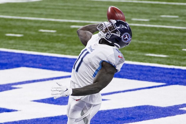 Tennessee Titans wide receiver A.J. Brown (11) celebrates returning an onside kick for a touchdown against the Indianapolis Colts in the second half of an NFL football game in Indianapolis, Sunday, Nov. 29, 2020. (AP Photo/AJ Mast)