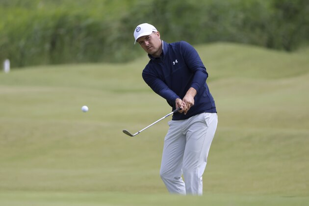 United States' Jordan Spieth chips onto the 15th green during a practice round for the British Open Golf Championship at Royal St George's golf course Sandwich, England, Tuesday, July 13, 2021. The Open starts Thursday, July, 15. (AP Photo/Ian Walton)